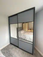 Denim Blue panels quater panels with mirror in charcoal frames, fitted in Ingleby Barwick